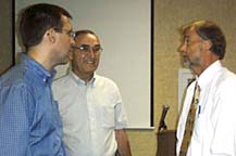 From left to right: Brooklyn Centre's Brian Cummins and Brooklyn's Tom Coyne with Paul Alsenas